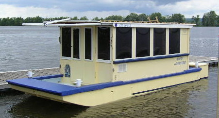 Bolger Houseboat at a dock